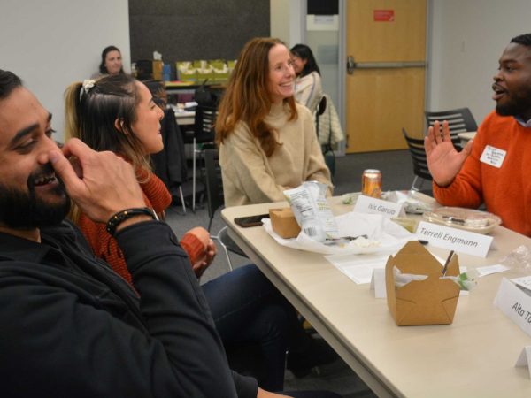 Amazon Fellows and members of Basilica Bio share ideas and laughter during a discussion at an SVP Seattle session focused on community-led philanthropy.